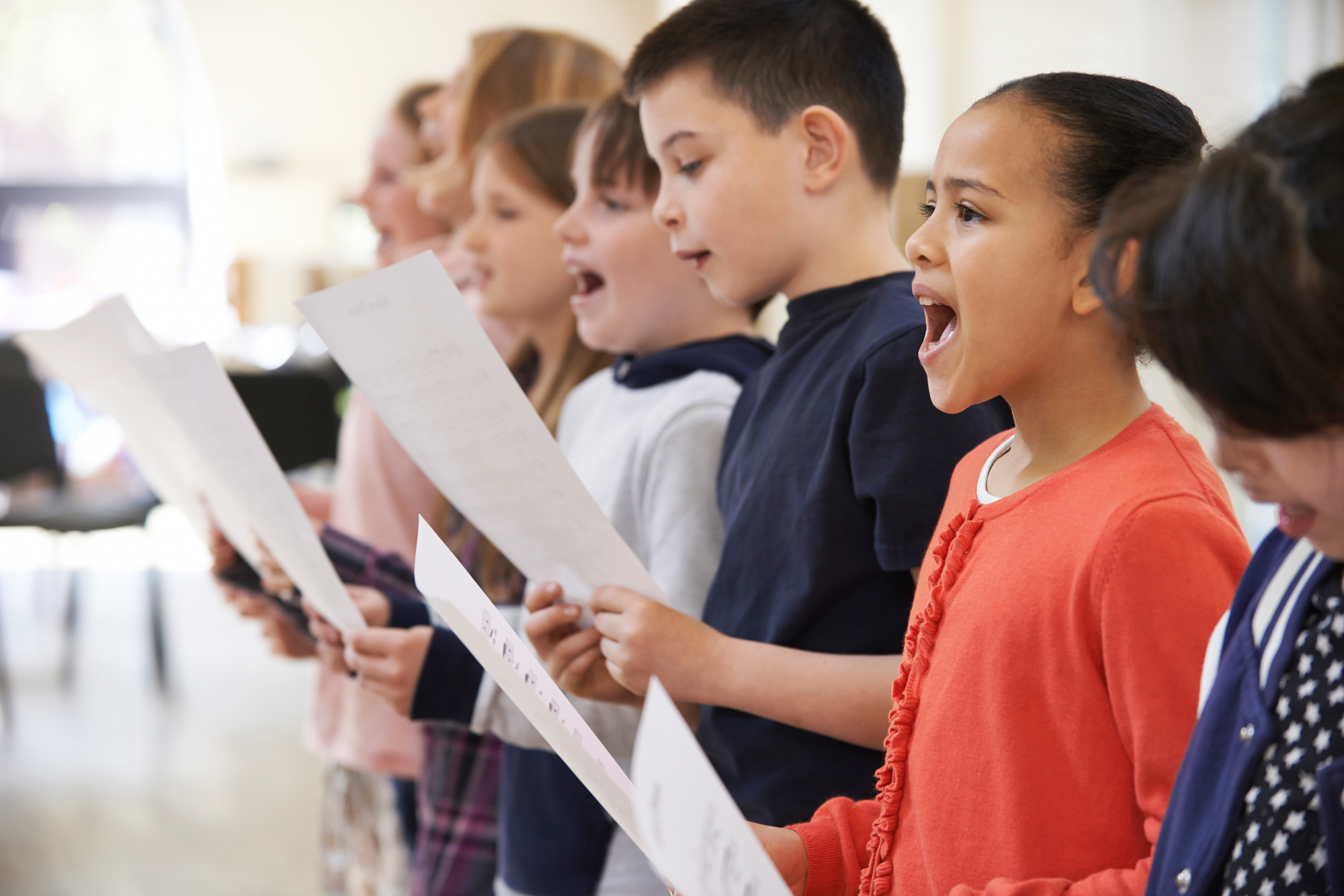 Vocal lesson for children with guidance from a music teacher